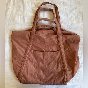 BAGGU travel cloud bag in terra cotta. Discontinued color. Good used condition.